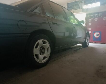 Черный Опель Омега, объемом двигателя 2 л и пробегом 246 тыс. км за 700 $, фото 1 на Automoto.ua