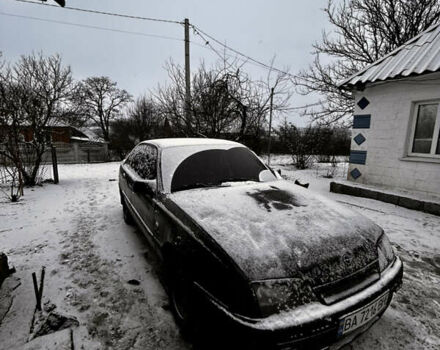 Чорний Опель Омега, об'ємом двигуна 1.77 л та пробігом 235 тис. км за 1200 $, фото 1 на Automoto.ua