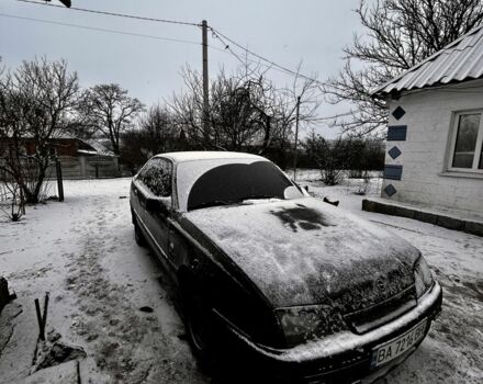 Чорний Опель Омега, об'ємом двигуна 1.8 л та пробігом 275 тис. км за 1200 $, фото 1 на Automoto.ua