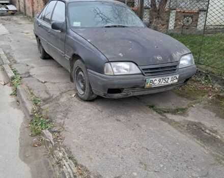 Черный Опель Омега, объемом двигателя 2 л и пробегом 400 тыс. км за 350 $, фото 1 на Automoto.ua