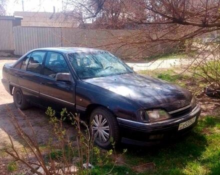 Черный Опель Омега, объемом двигателя 2 л и пробегом 200 тыс. км за 900 $, фото 1 на Automoto.ua