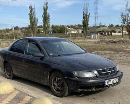 Черный Опель Омега, объемом двигателя 0 л и пробегом 300 тыс. км за 24 $, фото 1 на Automoto.ua