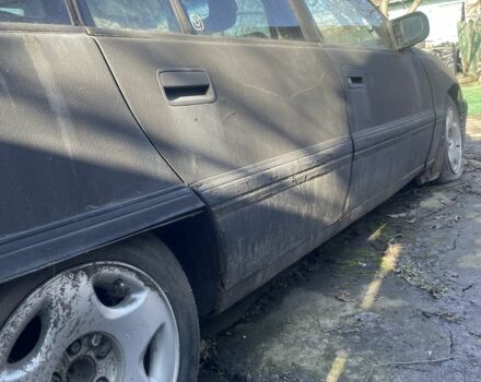 Черный Опель Омега, объемом двигателя 2.6 л и пробегом 325 тыс. км за 452 $, фото 1 на Automoto.ua