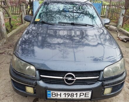 Черный Опель Омега, объемом двигателя 2.5 л и пробегом 361 тыс. км за 1200 $, фото 1 на Automoto.ua