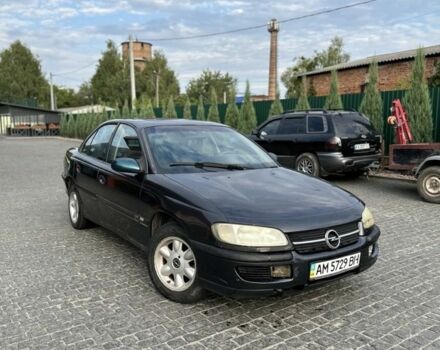 Черный Опель Омега, объемом двигателя 2.5 л и пробегом 288 тыс. км за 2150 $, фото 1 на Automoto.ua