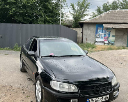 Черный Опель Омега, объемом двигателя 2.5 л и пробегом 450 тыс. км за 2999 $, фото 1 на Automoto.ua