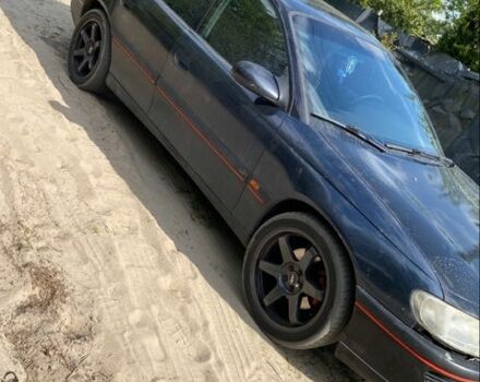 Черный Опель Омега, объемом двигателя 2.5 л и пробегом 247 тыс. км за 2300 $, фото 1 на Automoto.ua