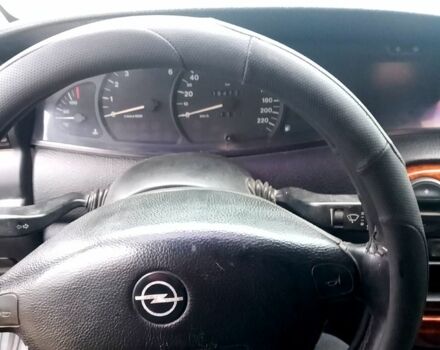 Черный Опель Омега, объемом двигателя 2.5 л и пробегом 330 тыс. км за 1300 $, фото 1 на Automoto.ua