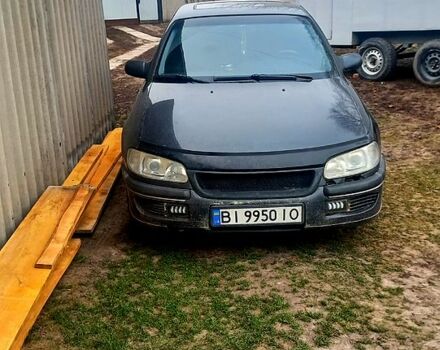 Черный Опель Омега, объемом двигателя 2.5 л и пробегом 338 тыс. км за 1600 $, фото 1 на Automoto.ua