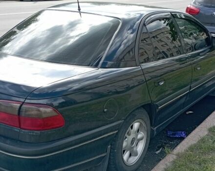 Черный Опель Омега, объемом двигателя 2.5 л и пробегом 317 тыс. км за 1700 $, фото 1 на Automoto.ua