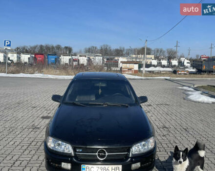 Черный Опель Омега, объемом двигателя 2.5 л и пробегом 370 тыс. км за 1600 $, фото 1 на Automoto.ua