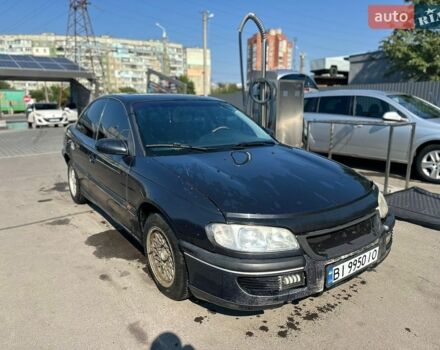 Черный Опель Омега, объемом двигателя 2.5 л и пробегом 350 тыс. км за 1674 $, фото 1 на Automoto.ua
