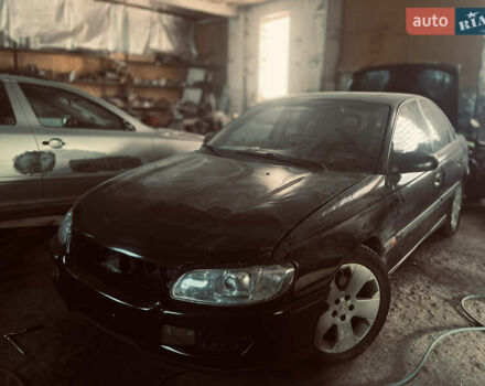 Черный Опель Омега, объемом двигателя 2.5 л и пробегом 20 тыс. км за 1650 $, фото 1 на Automoto.ua