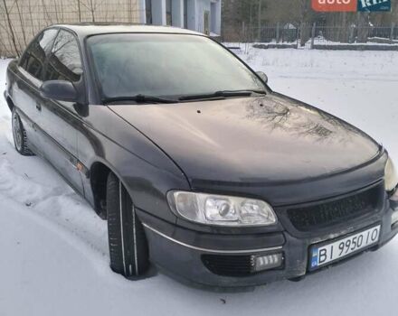 Черный Опель Омега, объемом двигателя 2.5 л и пробегом 300 тыс. км за 1800 $, фото 1 на Automoto.ua