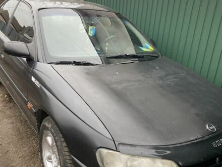 Черный Опель Омега, объемом двигателя 2.5 л и пробегом 370 тыс. км за 1655 $, фото 1 на Automoto.ua