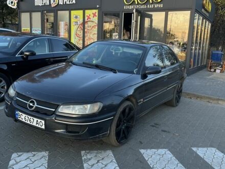 Черный Опель Омега, объемом двигателя 2.5 л и пробегом 200 тыс. км за 2600 $, фото 1 на Automoto.ua