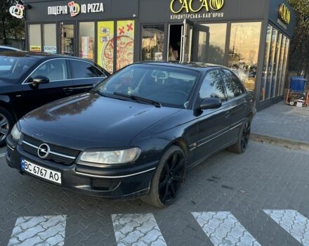 Черный Опель Омега, объемом двигателя 2.5 л и пробегом 200 тыс. км за 2600 $, фото 1 на Automoto.ua