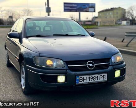 Черный Опель Омега, объемом двигателя 2.5 л и пробегом 250 тыс. км за 1500 $, фото 1 на Automoto.ua