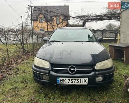 Черный Опель Омега, объемом двигателя 2.5 л и пробегом 274 тыс. км за 2000 $, фото 1 на Automoto.ua