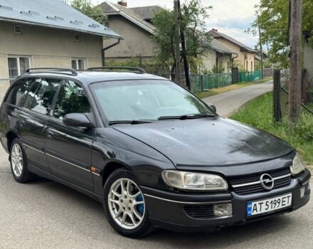 Черный Опель Омега, объемом двигателя 2.5 л и пробегом 411 тыс. км за 1200 $, фото 1 на Automoto.ua