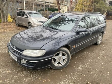 Черный Опель Омега, объемом двигателя 2.5 л и пробегом 200 тыс. км за 1300 $, фото 1 на Automoto.ua