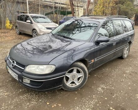 Черный Опель Омега, объемом двигателя 2.5 л и пробегом 200 тыс. км за 1300 $, фото 1 на Automoto.ua