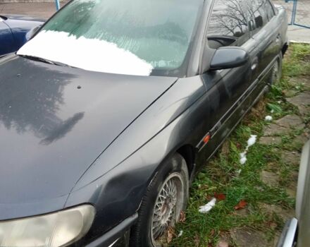 Чорний Опель Омега, об'ємом двигуна 2 л та пробігом 320 тис. км за 700 $, фото 1 на Automoto.ua