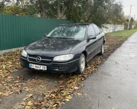 Черный Опель Омега, объемом двигателя 2.5 л и пробегом 378 тыс. км за 1500 $, фото 1 на Automoto.ua