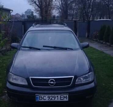 Черный Опель Омега, объемом двигателя 2.5 л и пробегом 380 тыс. км за 2150 $, фото 1 на Automoto.ua