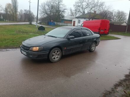 Черный Опель Омега, объемом двигателя 2 л и пробегом 300 тыс. км за 1500 $, фото 1 на Automoto.ua