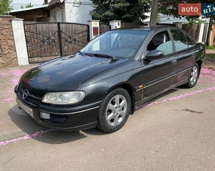 Черный Опель Омега, объемом двигателя 2.5 л и пробегом 440 тыс. км за 1500 $, фото 1 на Automoto.ua