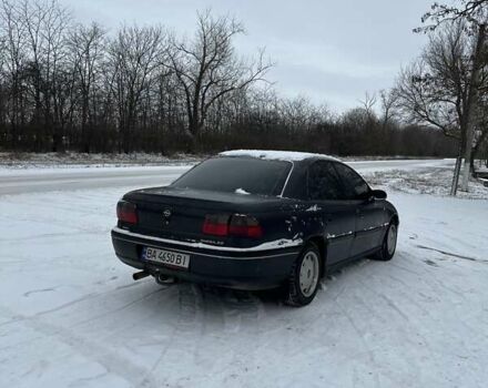 Черный Опель Омега, объемом двигателя 2 л и пробегом 345 тыс. км за 2400 $, фото 1 на Automoto.ua