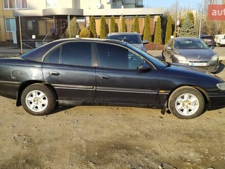 Чорний Опель Омега, об'ємом двигуна 2.5 л та пробігом 400 тис. км за 1650 $, фото 1 на Automoto.ua