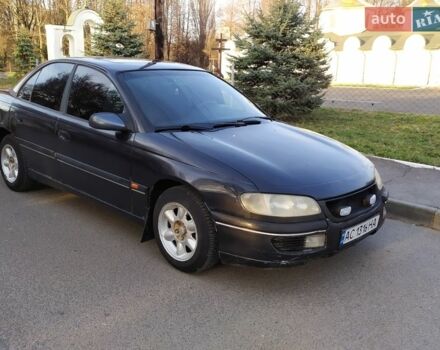 Черный Опель Омега, объемом двигателя 2.5 л и пробегом 400 тыс. км за 2100 $, фото 1 на Automoto.ua