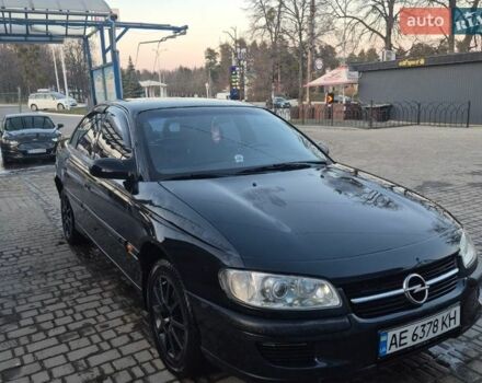 Черный Опель Омега, объемом двигателя 3 л и пробегом 400 тыс. км за 2000 $, фото 1 на Automoto.ua