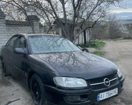 Черный Опель Омега, объемом двигателя 2.5 л и пробегом 250 тыс. км за 1200 $, фото 1 на Automoto.ua