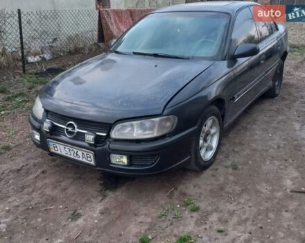 Черный Опель Омега, объемом двигателя 2.5 л и пробегом 330 тыс. км за 1600 $, фото 1 на Automoto.ua