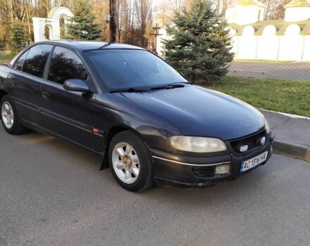 Черный Опель Омега, объемом двигателя 2.5 л и пробегом 400 тыс. км за 2100 $, фото 1 на Automoto.ua