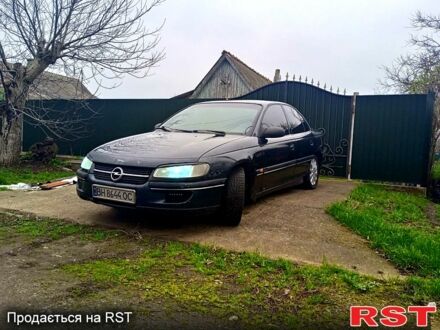 Чорний Опель Омега, об'ємом двигуна 2 л та пробігом 280 тис. км за 1350 $, фото 1 на Automoto.ua