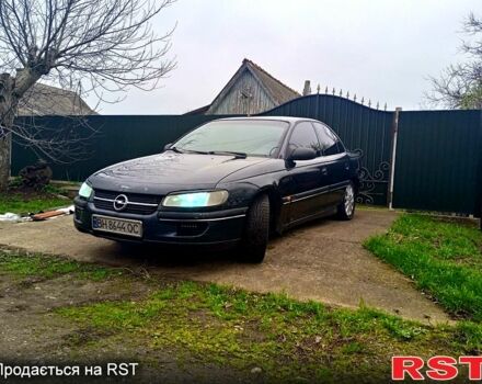 Черный Опель Омега, объемом двигателя 2 л и пробегом 280 тыс. км за 1350 $, фото 1 на Automoto.ua