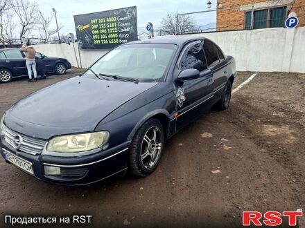 Чорний Опель Омега, об'ємом двигуна 2 л та пробігом 240 тис. км за 800 $, фото 1 на Automoto.ua