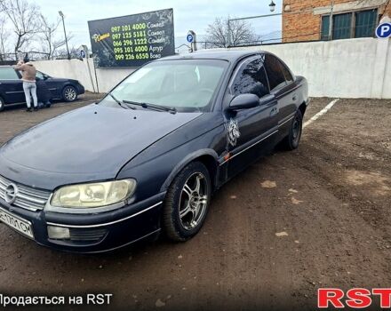 Черный Опель Омега, объемом двигателя 2 л и пробегом 240 тыс. км за 800 $, фото 1 на Automoto.ua