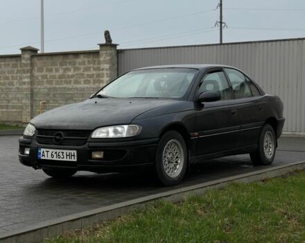 Черный Опель Омега, объемом двигателя 2 л и пробегом 320 тыс. км за 1399 $, фото 1 на Automoto.ua