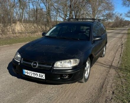 Черный Опель Омега, объемом двигателя 2 л и пробегом 344 тыс. км за 1999 $, фото 1 на Automoto.ua