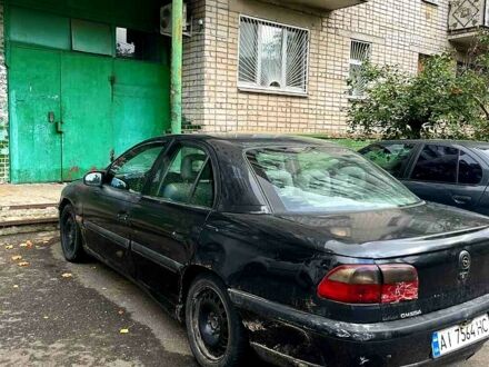 Черный Опель Омега, объемом двигателя 2.5 л и пробегом 0 тыс. км за 1600 $, фото 1 на Automoto.ua