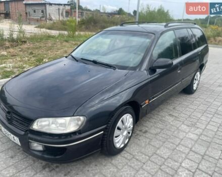 Чорний Опель Омега, об'ємом двигуна 2 л та пробігом 300 тис. км за 800 $, фото 1 на Automoto.ua