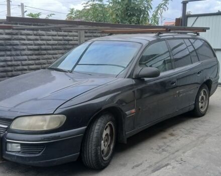 Чорний Опель Омега, об'ємом двигуна 2 л та пробігом 230 тис. км за 1100 $, фото 1 на Automoto.ua