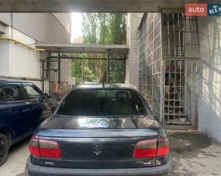 Чорний Опель Омега, об'ємом двигуна 3 л та пробігом 300 тис. км за 1300 $, фото 1 на Automoto.ua