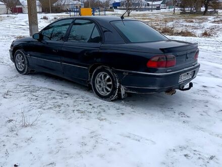 Чорний Опель Омега, об'ємом двигуна 2 л та пробігом 400 тис. км за 1300 $, фото 1 на Automoto.ua