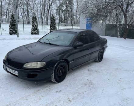 Черный Опель Омега, объемом двигателя 2 л и пробегом 250 тыс. км за 1300 $, фото 1 на Automoto.ua